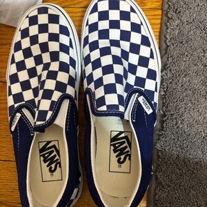 Navy blue checkered slip on vans